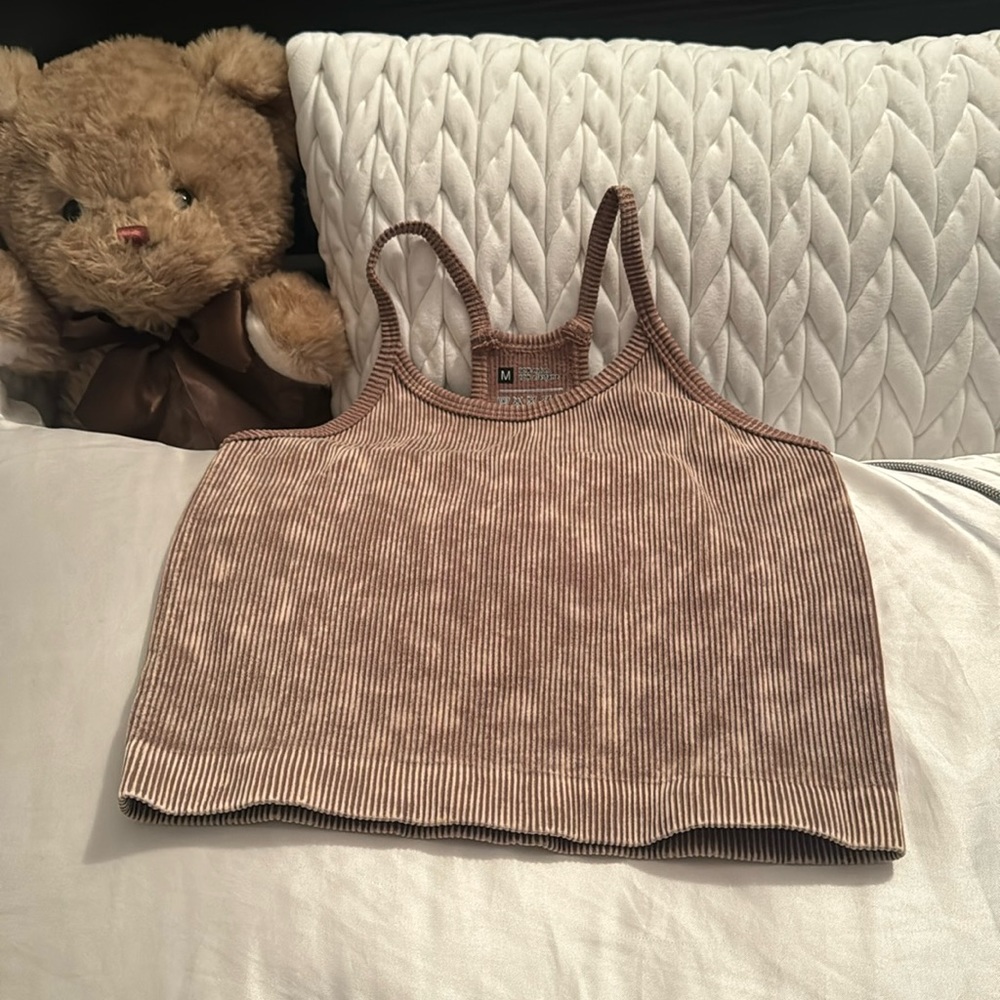 New. Never worn. Fits like a small.